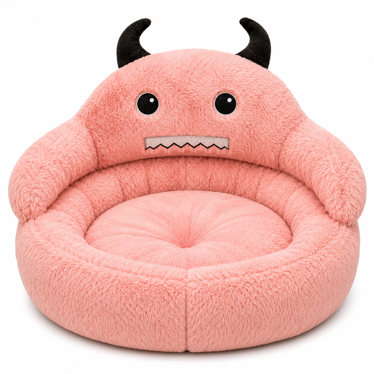 Pink plush pet bed with monster face design on a white background